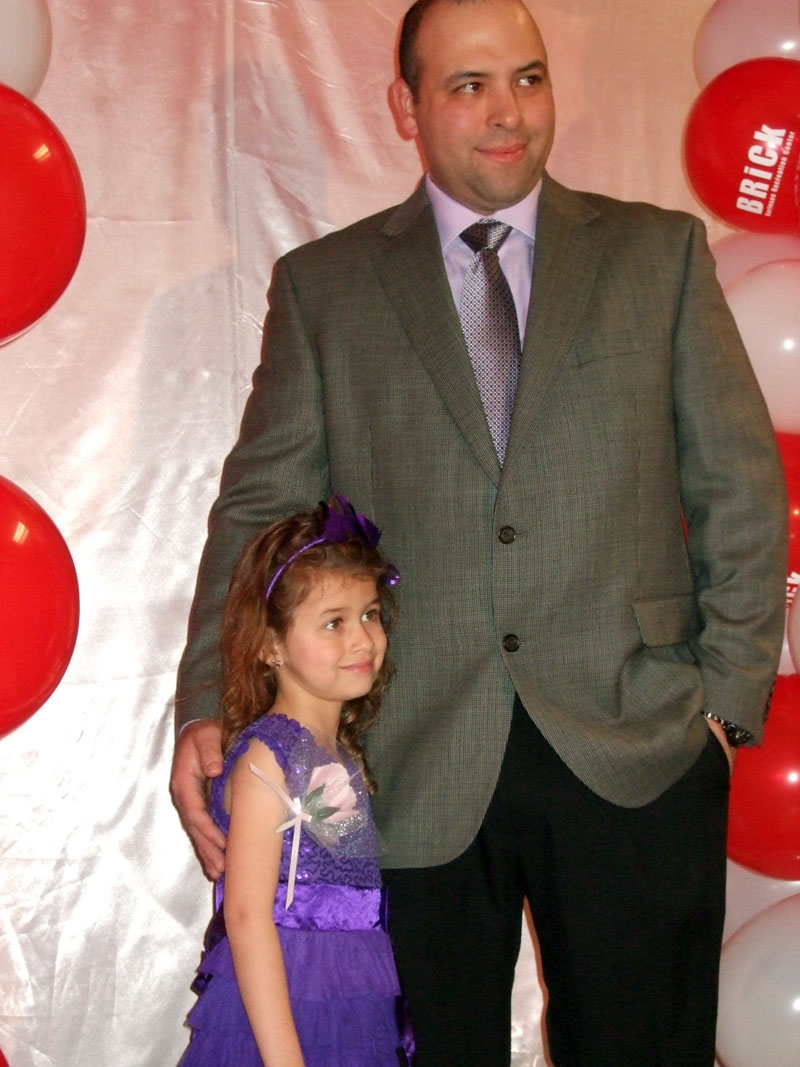 photo of a dad and daughter